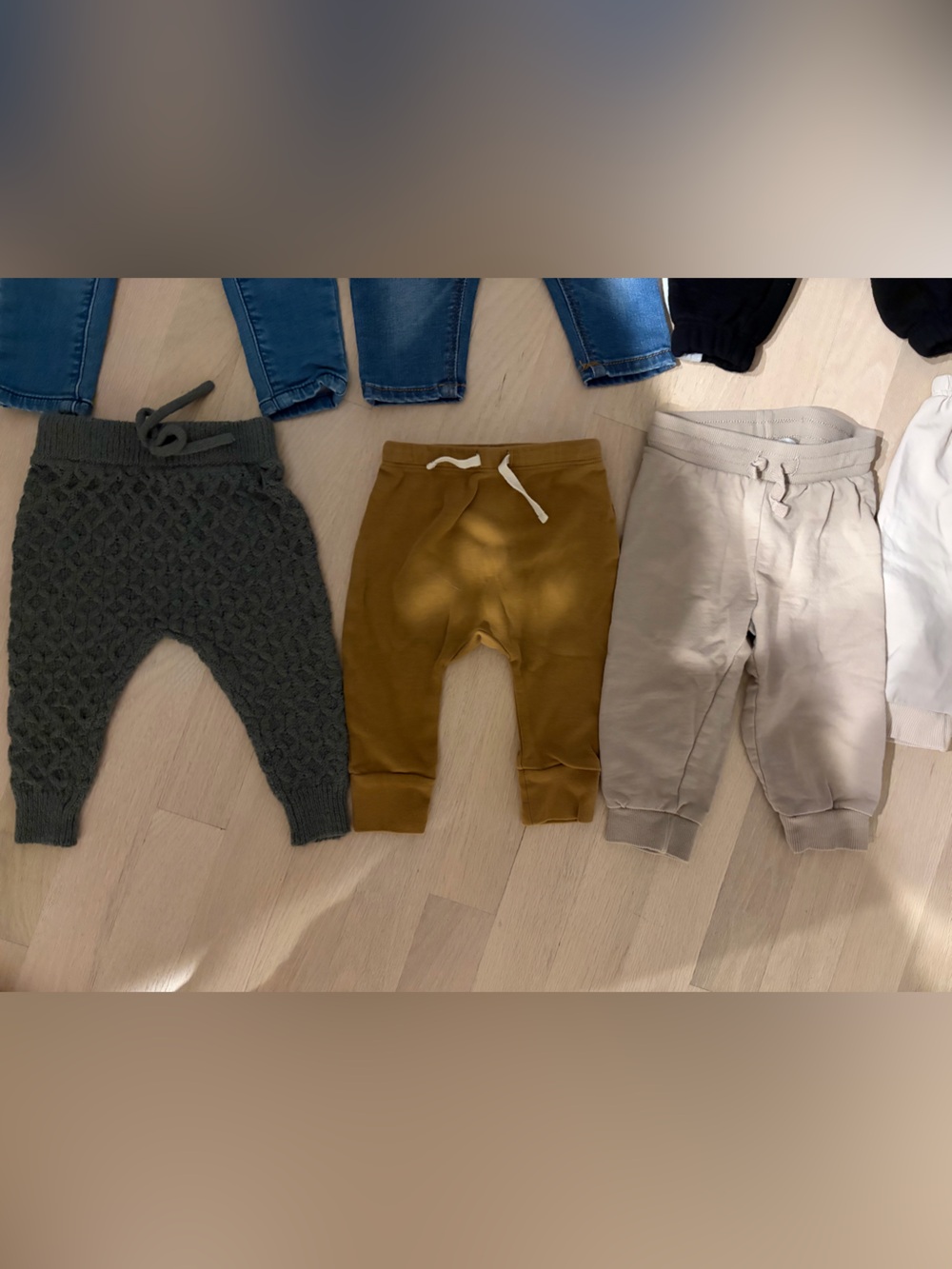 Lot of 9 pairs of baby sweatpants size 3-6 perfect condition.
